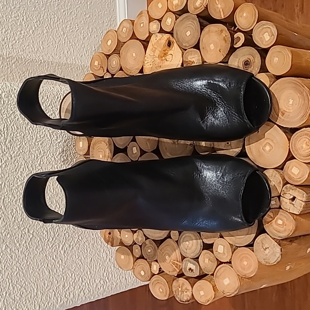 Vince Camuto sling back leather booties.